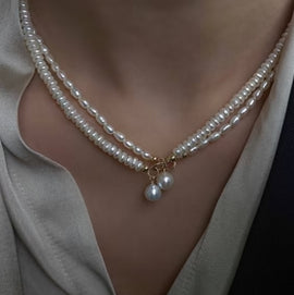 The Art of Layering: How to Mix and Match House of Pearls Jewelry for a Unique Look