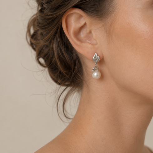 Earrings by House Of Pearls: 10–11mm Australian White South Sea pearl botanical leaf drop with silver-tone metal.