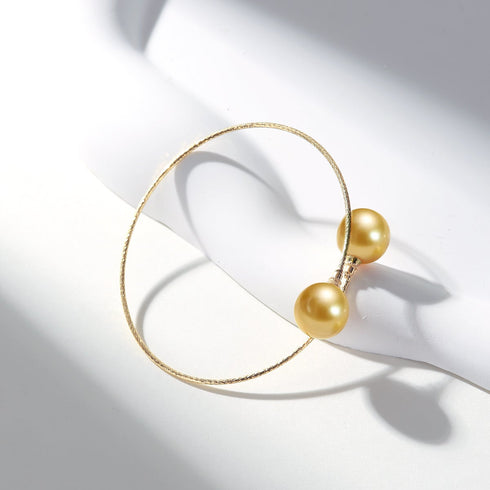 Golden South Sea Pearl Bangle Bracelet with two 10-11mm pearls in 18k gold by House of Pearls-TA