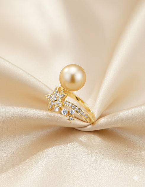 Open gold ring with a 10–11mm South Sea Golden Pearl and cubic zirconia star accents