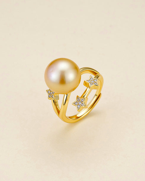 Ring featuring a 10-11mm South Sea golden pearl and cubic zirconia star accents on an open gold band