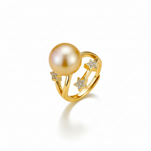 Ring: gold open ring with 10–11mm South Sea golden pearl and star-shaped cubic zirconia accents, House Of Pearls.