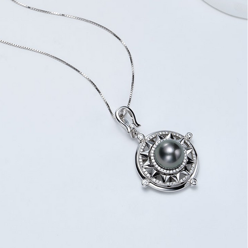 Necklace pendant: 10–11mm Tahitian pearl sunflower compass in silver setting on a silver chain; House Of Pearls - TA.