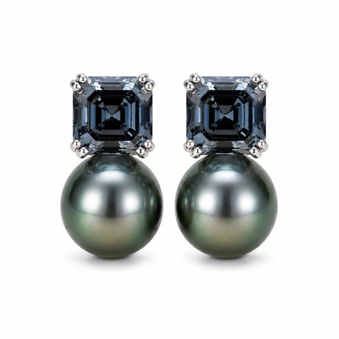 Pair of earrings featuring 10–11mm baroque Tahitian black pearls and dark grey CZs set in silver.