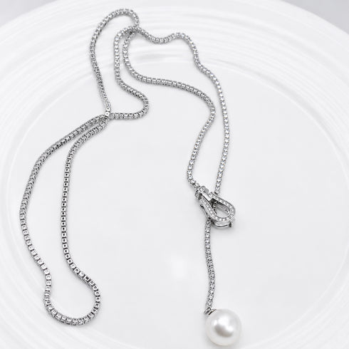 Necklace: House Of Pearls 10–11mm freshwater pearl tennis chain in silver tone.