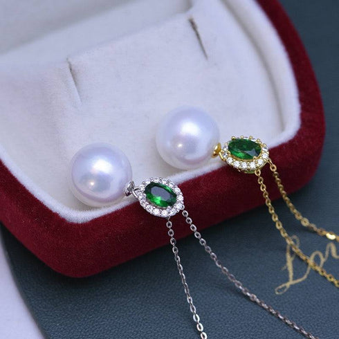Necklaces: 11-12mm freshwater pearl and green gem pendant with diamond halo on silver and gold-tone chains.