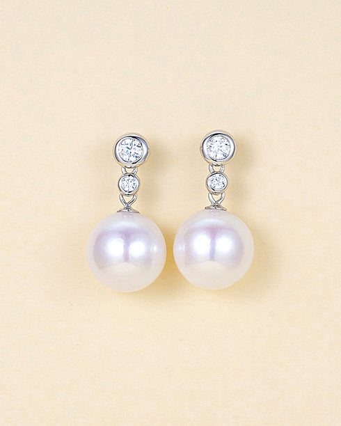 Earrings: 11–12mm freshwater pearl zircon drop earrings in a silver-tone setting, pair.