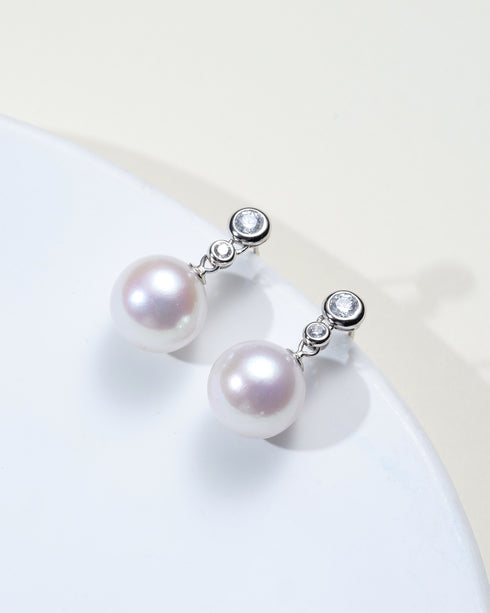 Pair of 11-12mm freshwater pearl zircon drop earrings with silver-tone settings