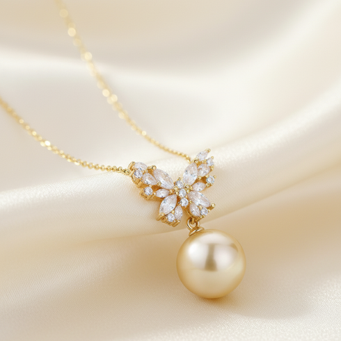 Butterfly pendant necklace with 11–12mm South Sea golden pearl and cubic zirconia accents on a gold chain by House Of Pearls.