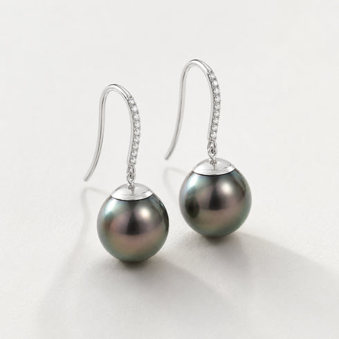 Earrings: Tahitian black pearl drop earrings, 11–12mm, 18K white gold with diamond-accented hooks