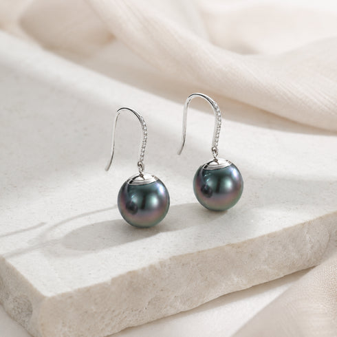 Pair of 11-12mm Tahitian black pearl drop earrings in 18K white gold with diamond-studded hooks, House Of Pearls XM.
