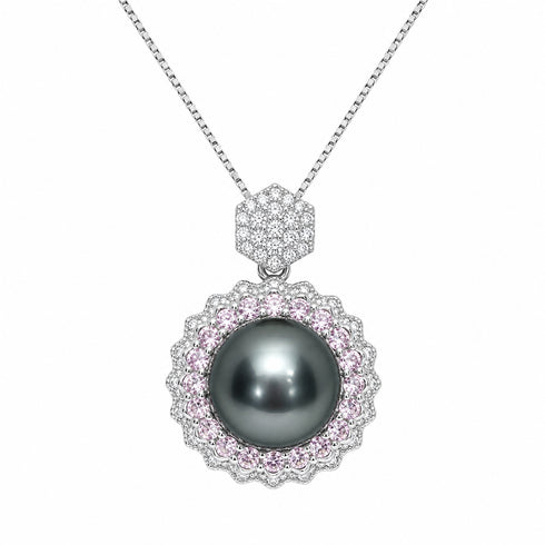 Necklace: 11–12mm Tahitian pearl pendant with pink CZ halo in sterling silver, House of Pearls.