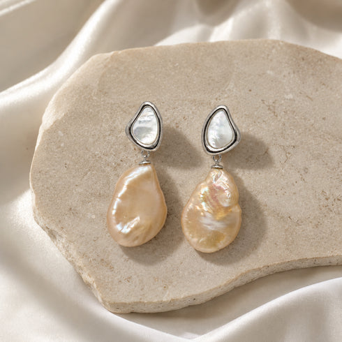Pair of 11-13mm freshwater peach baroque pearl shell stud earrings with silver-tone drop settings