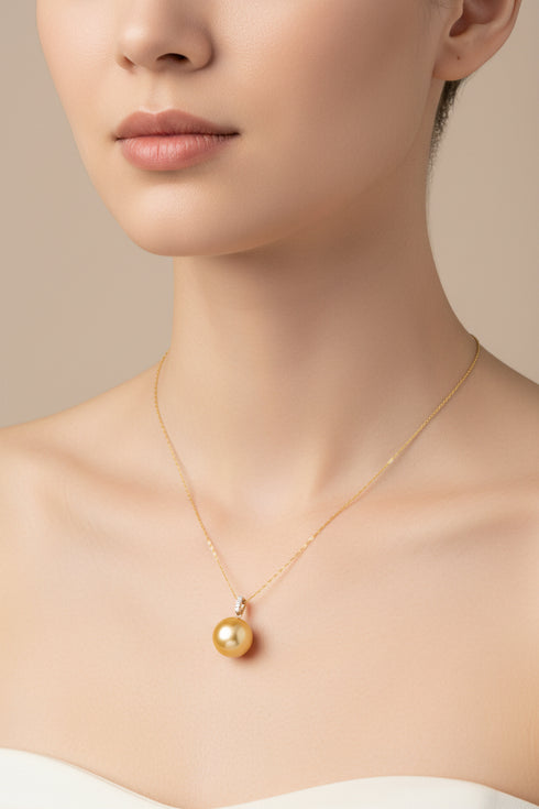 12-13mm Golden South Sea Pearl Triple Accent Pendant Necklace on a delicate gold chain with diamond accent