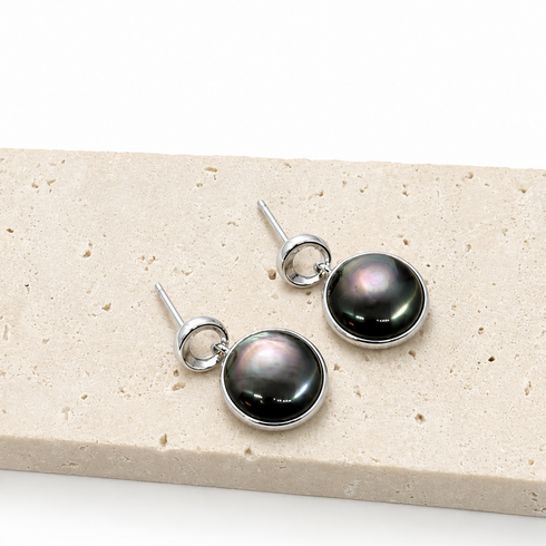 Earrings: 13mm black mother-of-pearl noir nacre drops in silver bezel, House Of Pearls pair
