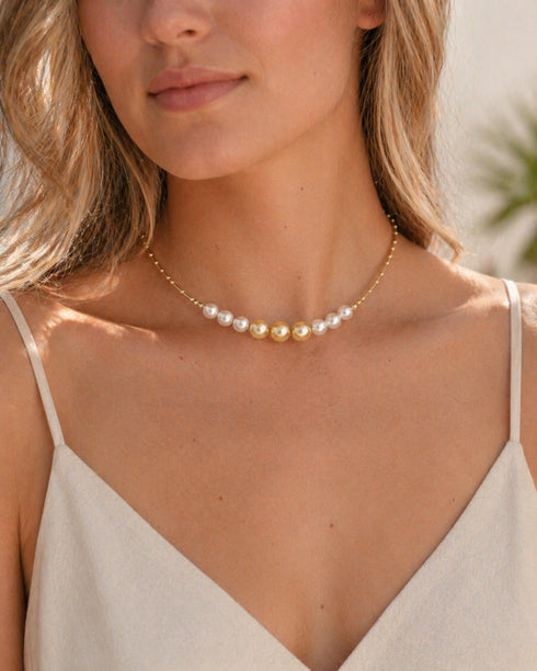 Choker necklace with alternating white Akoya and golden South Sea pearls on an 18K gold chain
