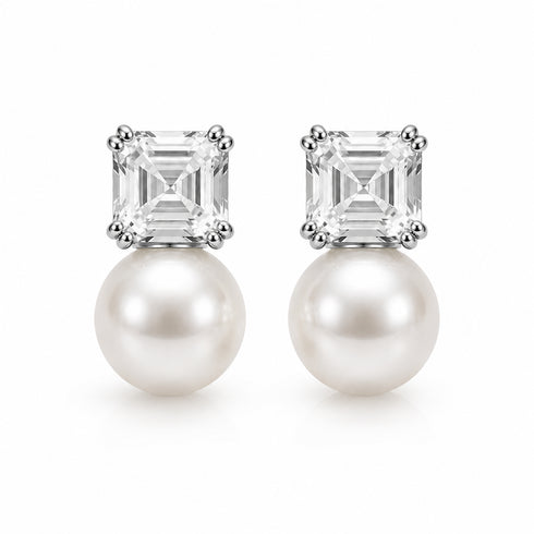 Pearl drop earrings with square-cut clear stones in silver settings; pair of white pearls