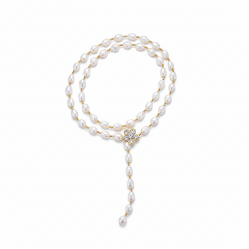 Necklace: 26-Inch adjustable baroque pearl and gold bead design with floral crystal clasp and tassel drop
