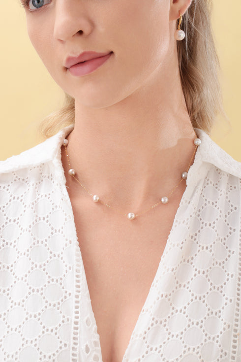 White freshwater pearl tincup necklace with 18K gold chain and matching pearl drop earrings set