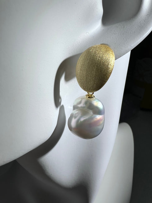 Earrings: brushed gold oval drop with 13–14mm white South Sea baroque pearl