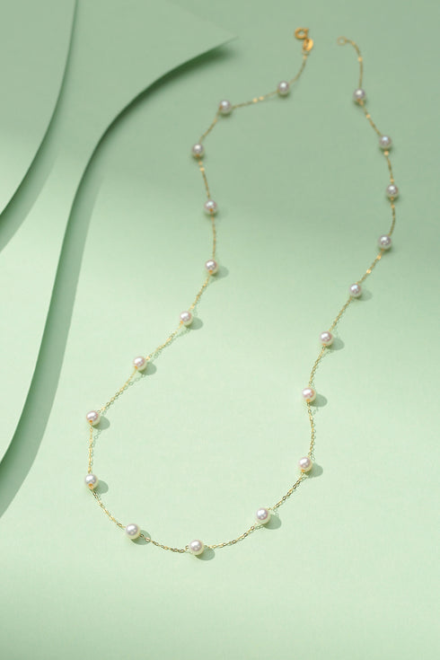 3-4mm freshwater pearl tincup necklace on an 18K gold chain
