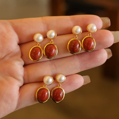 Red oval gemstone pearl drop earrings set of five pairs with white pearl studs and gold-tone bezels