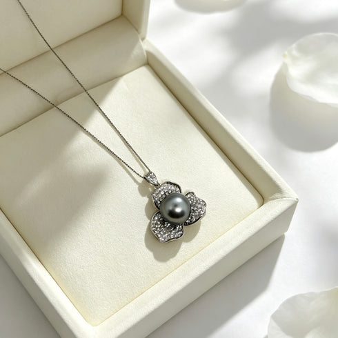 Necklace: Tahitian South Sea pearl flora pendant with diamond-studded flower on silver chain (House Of Pearls XM)