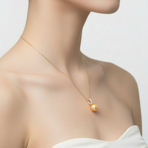 South Sea pearl pendant necklace with a 12–13mm golden milk-drop pearl on a delicate gold chain