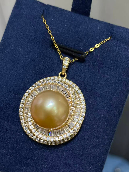 Necklace with a 12-13mm Golden South Sea Pearl crystal halo pendant on a gold chain.
