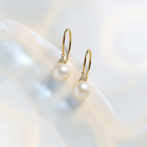 Earrings: pair of 7-8mm White Akoya Pearl Hook Earrings in 18K gold with diamond accents, House of Pearls