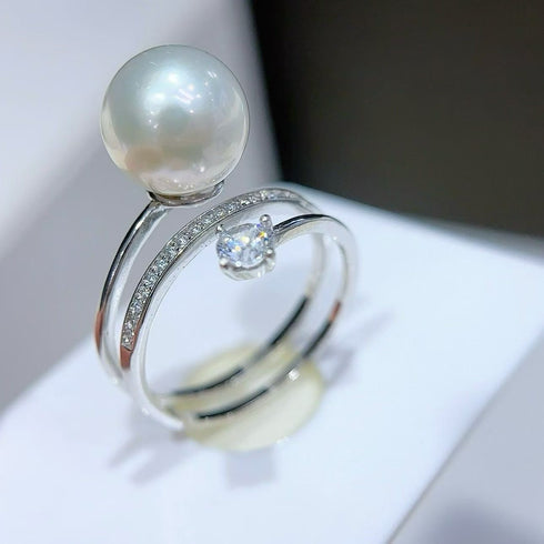Ring featuring an 8-9mm Akoya pearl with a diamond-accented silver band by House Of Pearls