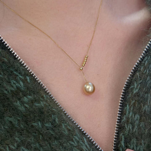 Y-necklace with 10–11mm Golden South Sea pearl pendant on a delicate gold chain