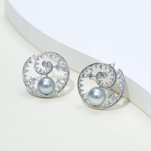 Pair of earrings: 8–9mm silver-blue pearl spiral zirconia studs with crystal accents