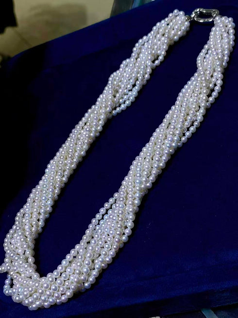 10-Strand Aurora Baby Pearl Necklace by House of Pearls - MZ; white pearls, multi-strand design.