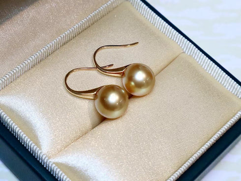 Earrings: 9–10mm Golden South Sea pearl drop pair with 18K gold hooks, House Of Pearls