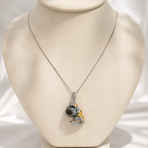 Tahitian Pearl Horse Pendant Necklace on a silver chain with a dark pearl and gold-tone horse charm