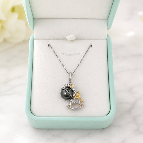 Tahitian pearl horse pendant necklace with silver chain and diamond accents
