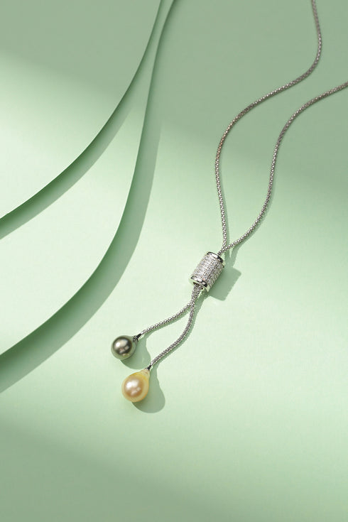 9-11mm double pearl pendant necklace on silver chain with a diamond-embellished cylinder pendant and two pearls