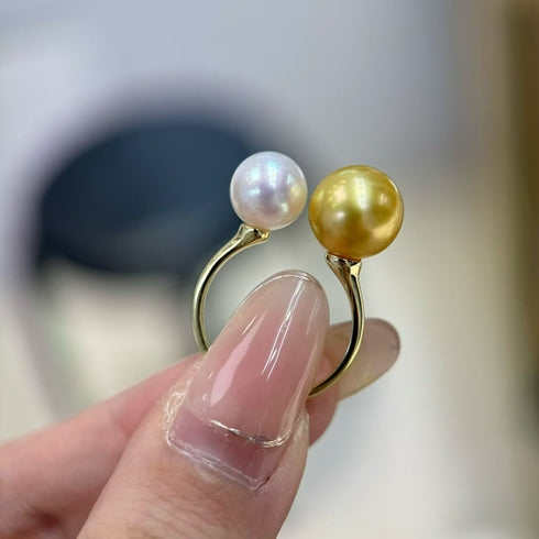 Golden South Sea & Akoya Pearl Double Pearl Open Ring featuring two pearls on a gold band.
