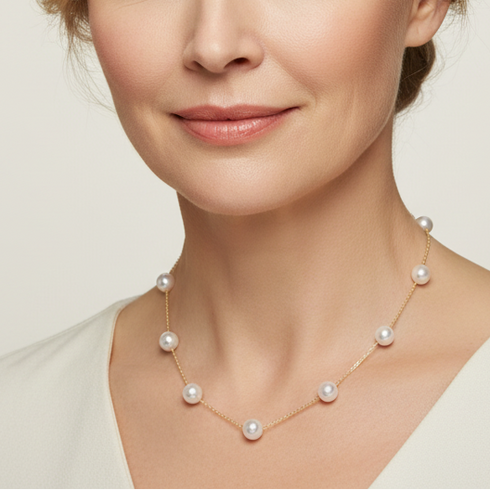 Necklace: Luxurious 9-Pearl Akoya tincup in 18K gold by House Of Pearls TA