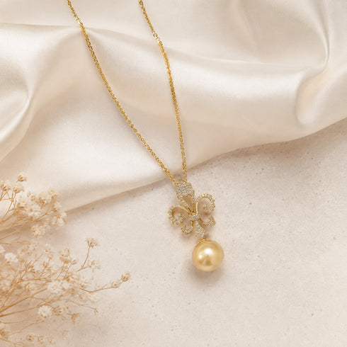 Necklace by House Of Pearls - TA: AAAA Golden South Sea Pearl Fleur-de-Lis pendant in 18K gold with lab diamonds