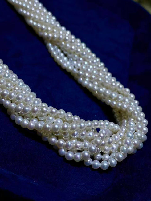 10-Strand Aurora Baby Pearl Necklace; white freshwater pearls in a multi-strand design