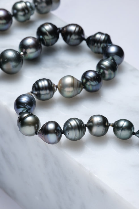 8-11mm Tahitian Pearl Baroque Circle Necklace with AAA-grade dark peacock pearls and iridescent luster
