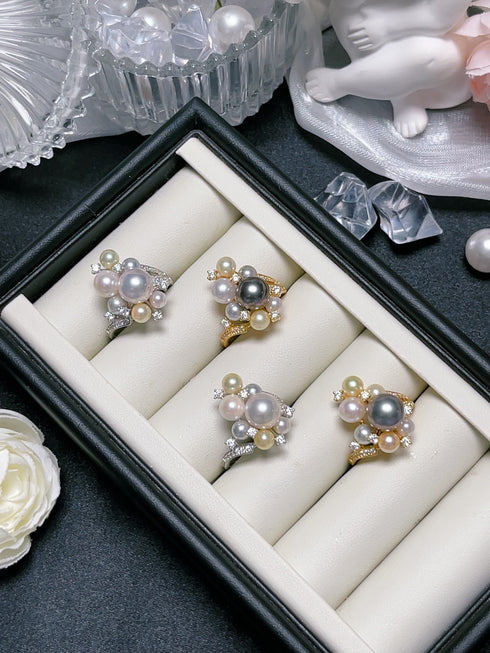 Three-color Akoya pearl cluster rings, set of 3, in a jewelry display box with diamond accents.