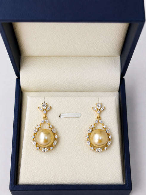 Pair of earrings: 10-11mm Golden South Sea pearl floral teardrop halo with diamond accents, gold-tone