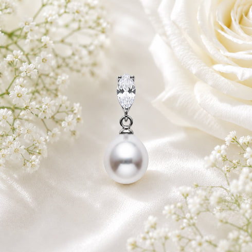 Pendant with white South Sea pearl waterdrop and marquise-cut cubic zirconia in a silver setting.