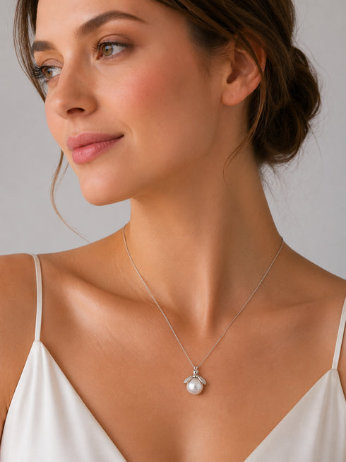 White South Sea Pearl Bee Pendant necklace by House Of Pearls on silver chain