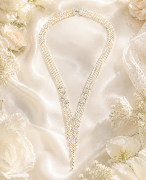 V-Shaped Aurora Pearl Sweater Necklace by House Of Pearls - TA, ivory multi-strand pearl necklace with a bow clasp