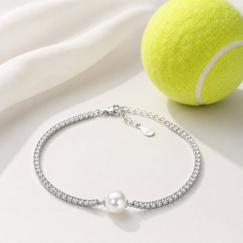 Aurora White Freshwater Pearl Tennis Bracelet with a single central white pearl and pave crystals on a silver-tone chain