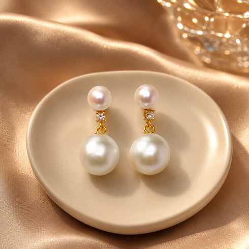 Pair of 9–10mm freshwater pearl duo sparkle earrings with gold-tone drops and diamond accents